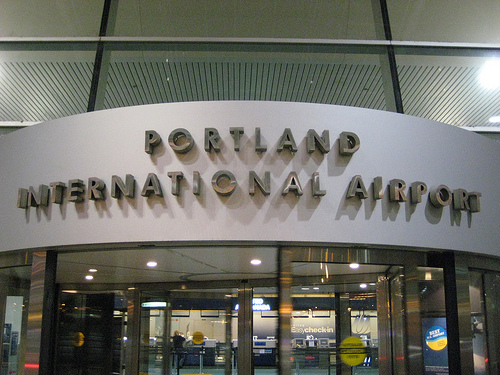 Others might be revealed , Voyager at Portland International Airport determined to have measles