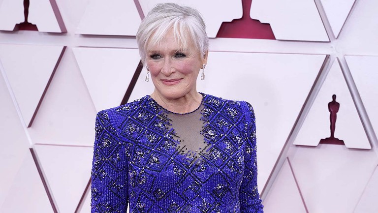 Glenn Close consumes a tunic, trousers, and gloves at the Oscars 2021