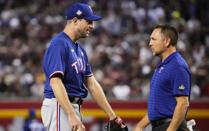 Max Scherzer of the Rangers leaves the World Series Game 3 due to what appears to be a back ailment