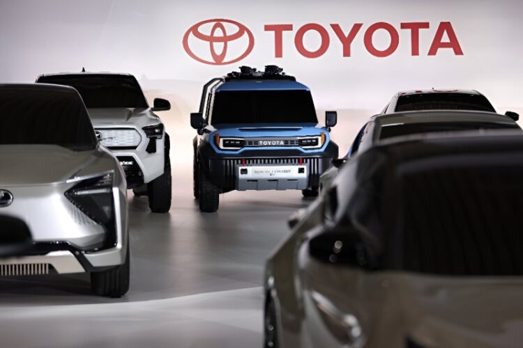 The sales of Toyota vehicles set a new global record as the company apologizes for scandals