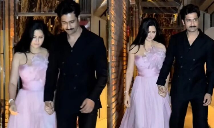 At a friend’s wedding a cute picture of Katrina Kaif and Vicky Kaushal shows off her VK mehndi