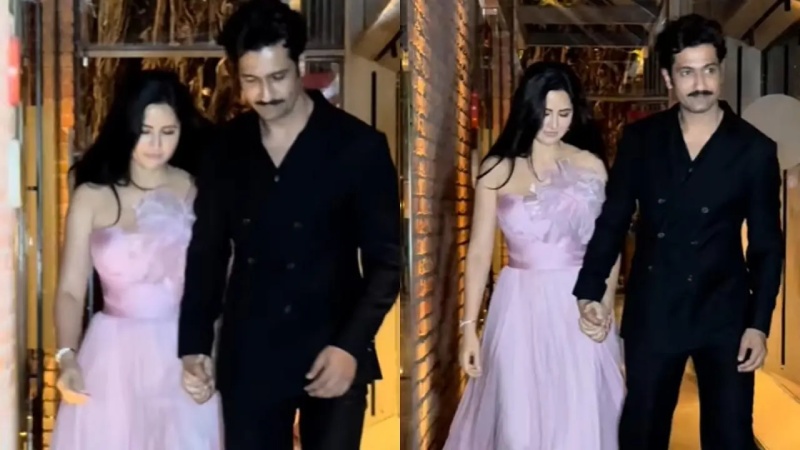 At a friend’s wedding a cute picture of Katrina Kaif and Vicky Kaushal shows off her VK mehndi